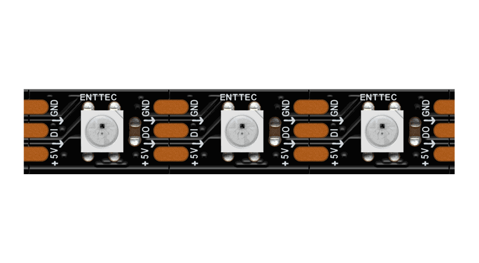 Close-up of the black PCB strip, three LEDs between copper solder pads marked ENTTEC, +5V, DI, DO and GND.