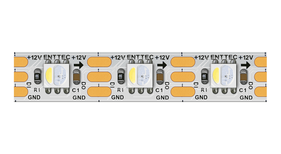 The same strip on a white PCB, a white emitter beside a three-in-one RGB emitter, between copper solder pads marked ENTTEC, +12V, DI, DO and GND.