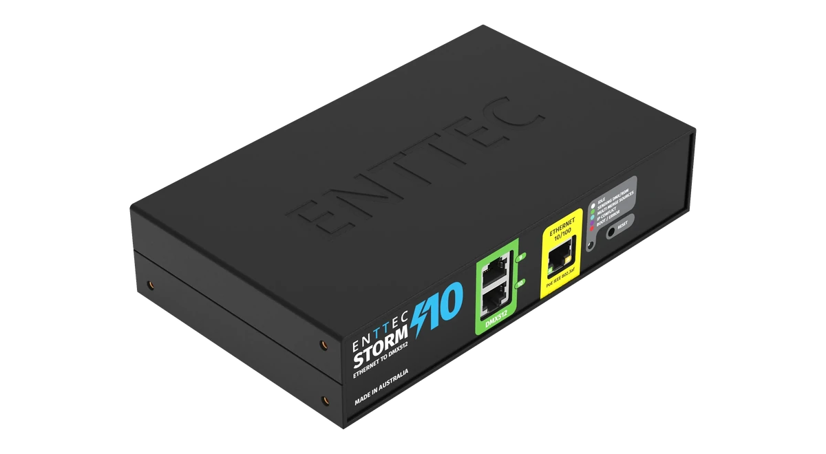 The Storm 10 at a three-quarter angle, a black steel enclosure with ENTTEC embossed across the lid, its front face carrying the ENTTEC STORM 10 name, a green DMX512 block holding two RJ45 ports numbered 9 and 10, a yellow ETHERNET 10/100 RJ45 and a recessed reset button.