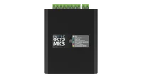 The OCTO MK3 seen from directly above, its lid printed 'ENTTEC OCTO MK3' beside a grey legend listing IDLE, DATA RECEIVE, START UP, IDENTIFY OUTPUT, MULTI MERGE SOURCES, IP CONFLICT, BOOT / ERROR and STANDALONE MODE, with three green screw terminal blocks along the top edge.