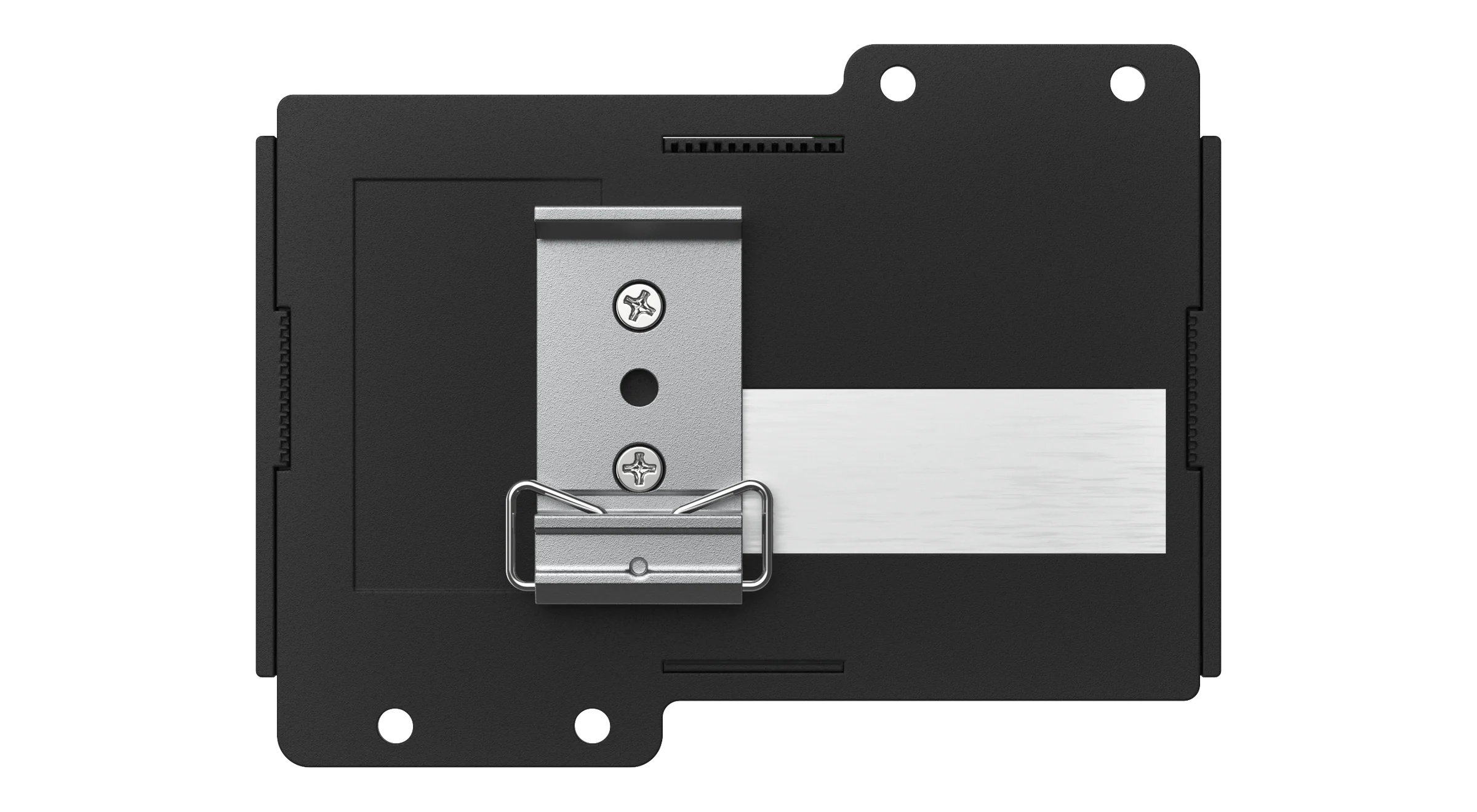 The underside of the black CVC4 enclosure, with mounting holes at the corners, a recessed panel, vent slots along two edges, a blank silver label area and the screwed-on metal DIN rail clip at the centre.