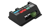 Angled view from above and the right, showing the printed face, the two RJ45 sockets and the green three-way terminal.