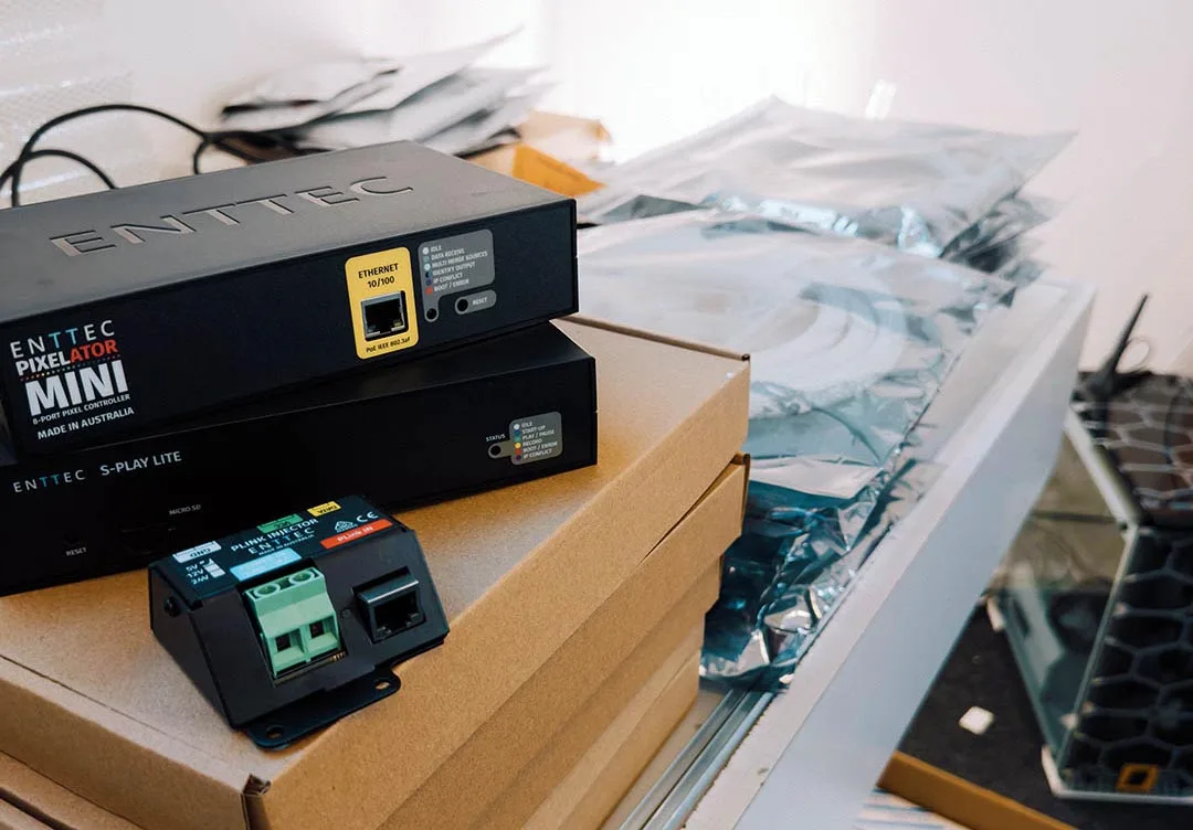 A PIXELATOR MINI, an S-PLAY LITE and a PLink Injector on site before installation