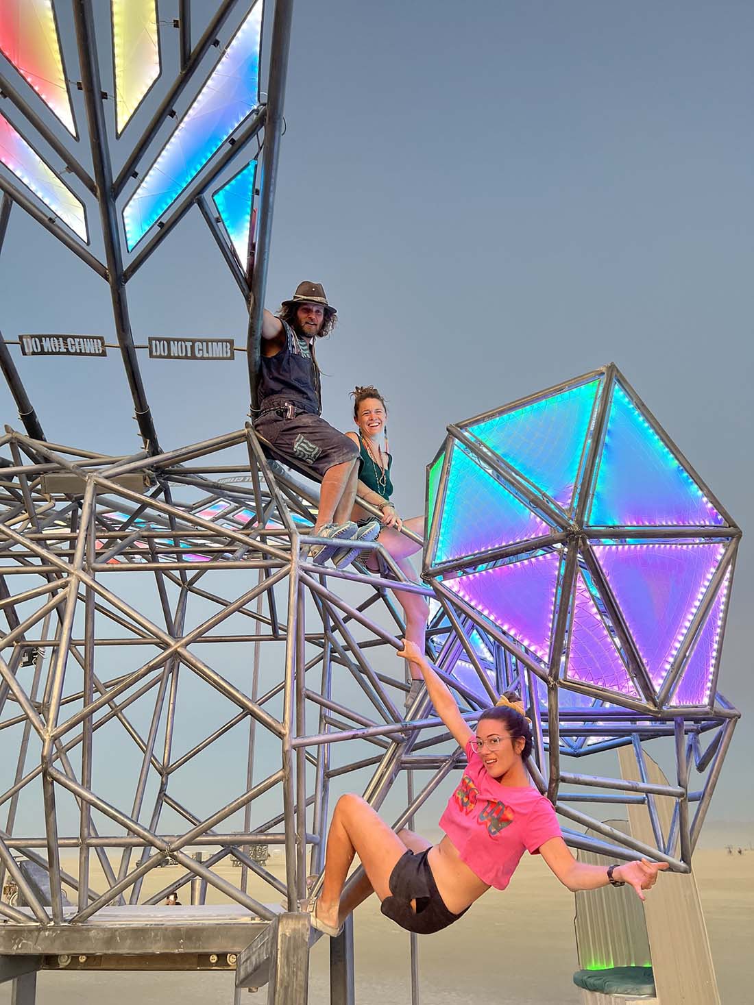 Lighting crew at Burning Man festival creating an installation with LED pixel strips