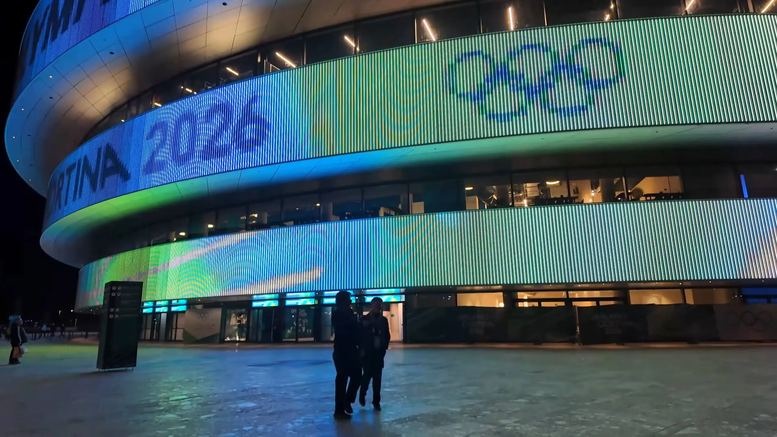 The Arena Milano media façade lit at night, driven by ENTTEC pixel control